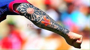 tatuajes de futbolistas messi en el brazo