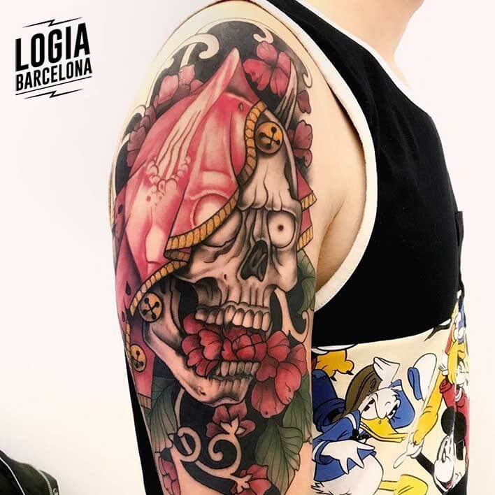 tatuaje brazo calavera logia tattoo stefano giorgi