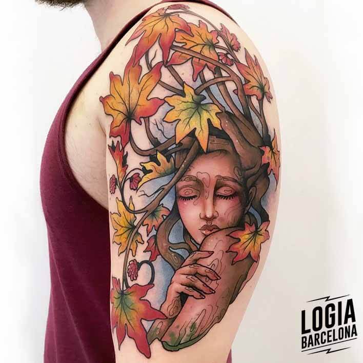 tatuaje brazo mujer arbol logia tattoo stefano giorgi