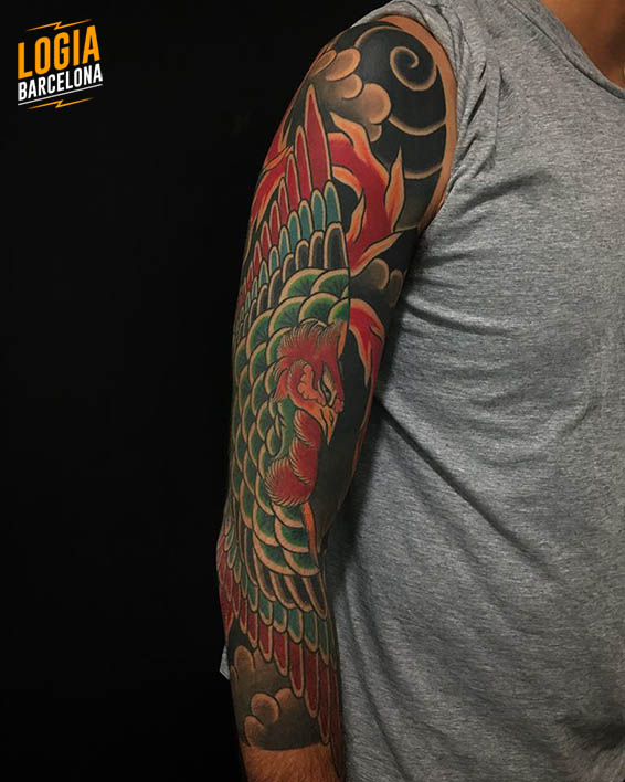 tatuaje brazo ave del paraiso logia barcelona