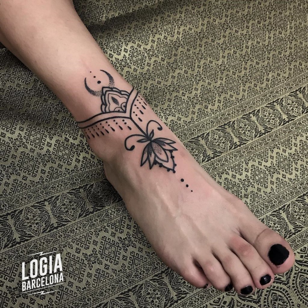 feet unalome tattoo