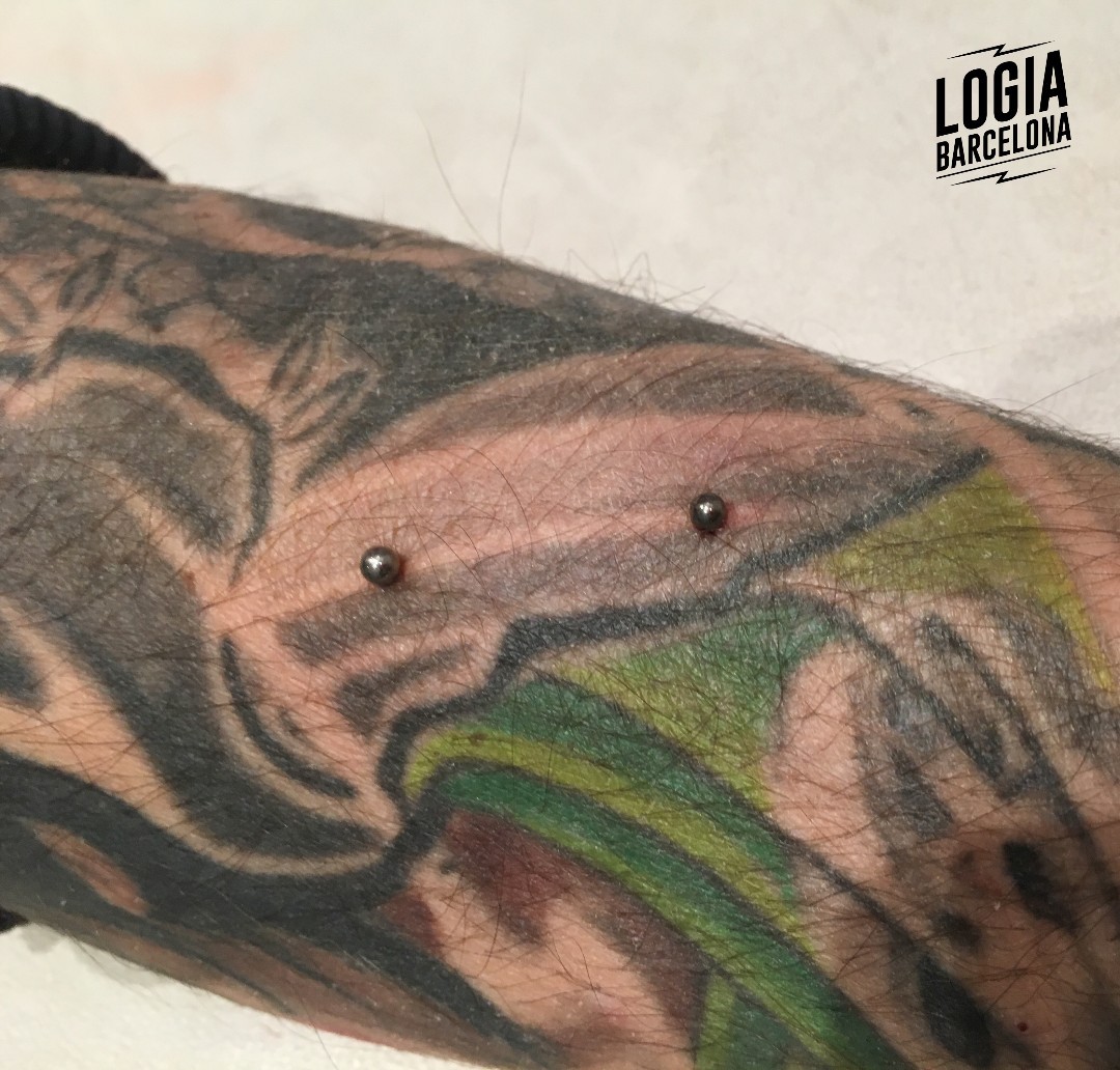 Piercing surface original brazo Logia Barcelona