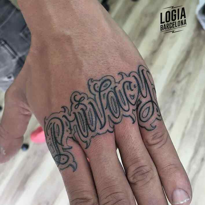 lettering knuckle tattoo