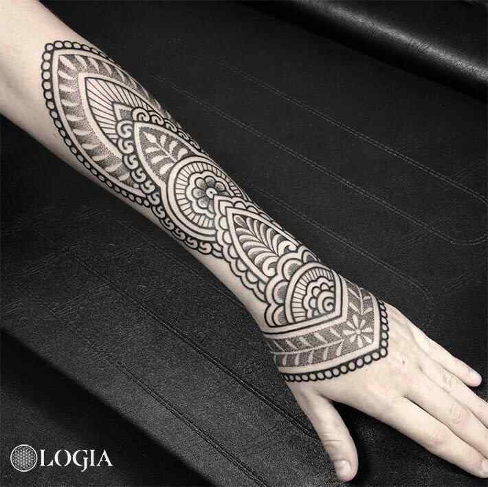 mandala tattoo hand